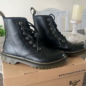 Black Dr Martens with gum heel.